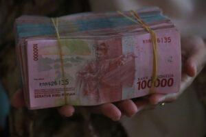 Rupiah Anjlok? AS-China Bernegosiasi, Investor Waspada!