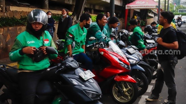 Pemerintah Dilema: Tarif Ojol Naik atau Potongan Driver Turun?