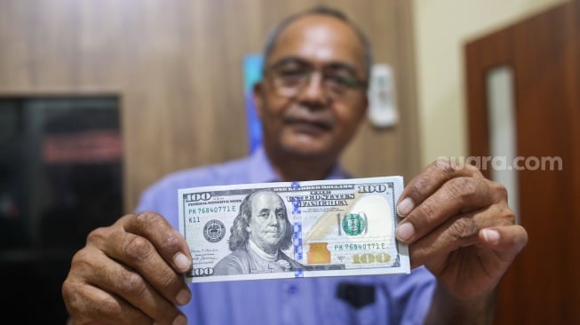 Rupiah Terancam Dolar AS? BI Waspadai Ancaman Kurs